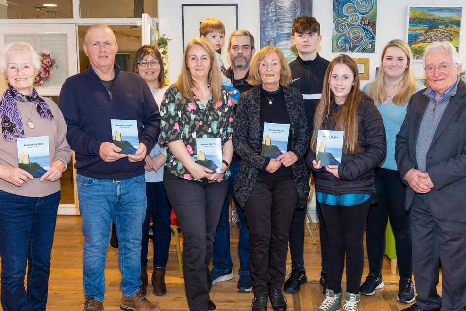 Attending the launch of Bernadette Ní Riada’s poetry book Beneath My Skin at the Kerry Writers’ Museum in Listowel recently were, front from left, Margaret O’Donnell, John McCann, Sandra Sheehan, Bernadette Ní Riada, Leah Sheehan and Jerry O’Donnell. Back, from left, Liza McCann, Sean and Jacob Dernan, Conor Sheehan and Nicole Murray. Photo by John Kelliher