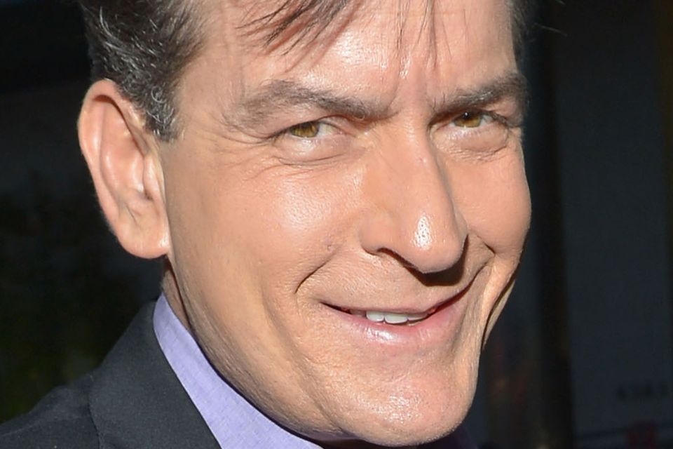 Charlie Sheen poses with Major League co-stars