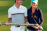 thumbnail: Rory McIlroy celebrates with Erica Stoll after winning the DP World Tour Golf Championship in Dubai