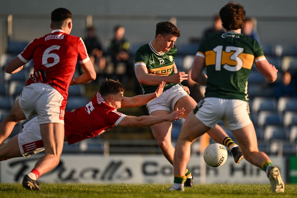 Tomás Kennedy scores Kerry's goal past Gearoid Daly of Cork during the Munster U-20 Football Championship Final