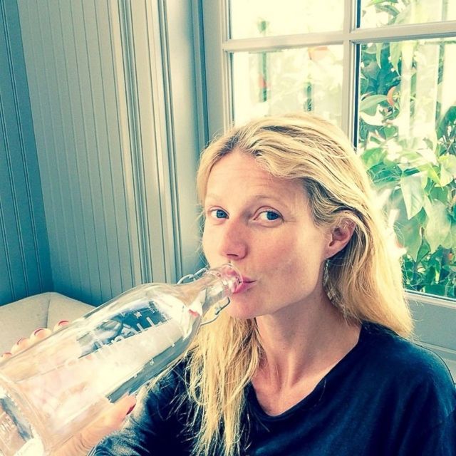 Gwyneth Paltrow cheated with a bottle of water, but still posted this selfie without a scrap of makeup.