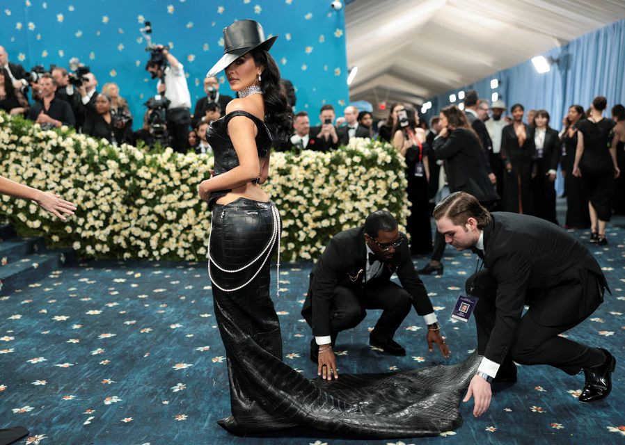 Kim Kardashian poses during the Met Gala, an annual fundraising gala held for the benefit of the Metropolitan Museum of Art's Costume Institute with this year's theme 'Superfine: Tailoring Black Style,' in New York City, New York, U.S., May 5, 2025. REUTERS/Mario Anzuoni     TPX IMAGES OF THE DAY     