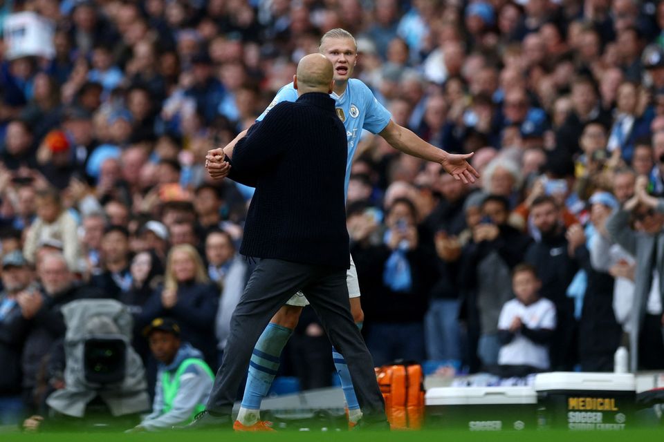 Manchester City's Erling Haaland clashes with manager Pep Guardiola after being substituted in the Premier League win over Wolves at the Etihad Stadium, Manchester