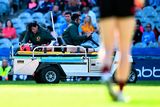 thumbnail: Down's Oisín Savage is helped off the pitch on a medical cart during the Tailteann Cup semi-final. Photo: Piaras ÓMídheach/Sportsfile