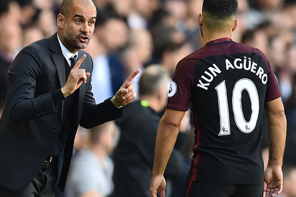 Manchester City's Spanish manager Pep Guardiola (L) gestures to Manchester City's Argentinian striker Sergio Aguero during the English Premier League football match between Tottenham Hotspur and Manchester City at White Hart Lane in London, on October 2, 2016. / AFP / Glyn KIRK / RESTRICTED TO EDITORIAL USE. No use with unauthorized audio, video, data, fixture lists, club/league logos or 'live' services. Online in-match use limited to 75 images, no video emulation. No use in betting, games or single club/league/player publications.  /         (Photo credit should read GLYN KIRK/AFP/Getty Images)