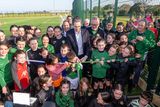 thumbnail: Taoiseach Simon Harris cuts the ribbon on the new pitch at Greystones United. Photo: Leigh Anderson