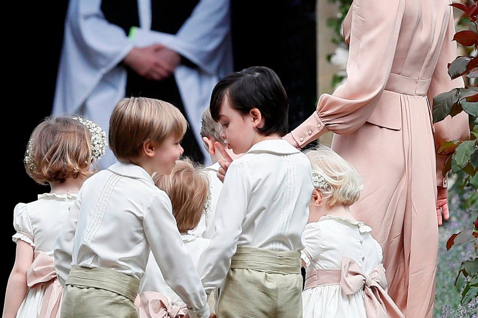 Britain's Catherine, Duchess of Cambridge (R), arrives with the pageboys and flower girls for the wedding of Pippa Middleton and James Matthews at St Mark's Church in Englefield, west of London, on May 20, 2017.    REUTERS/Kirsty Wigglesworth/Pool