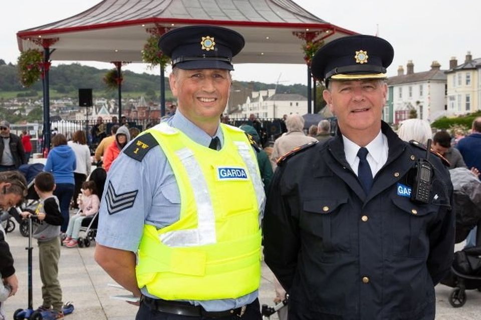 Sgt John Fitzpatrick (left) pictured with former Chief Superintendent John Quirke.