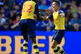 thumbnail: Arsenal's Alexis Sanchez (right) celebrates scoring his side's first goal of the game with teammate Arsenal's Yaya Sanogo (left)
