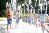 thumbnail: Children play in a fountain in Tullamore Town Park, Co Offaly