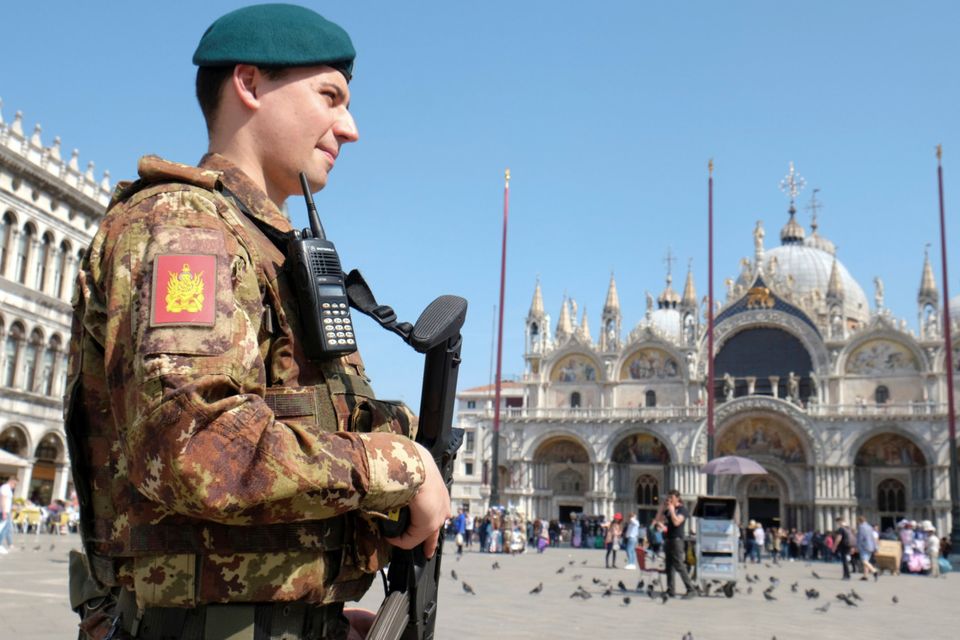 A soldier patrols Saint Mark's Square in Venice, Italy March 30, 2017. REUTERS/Manuel Silvestri