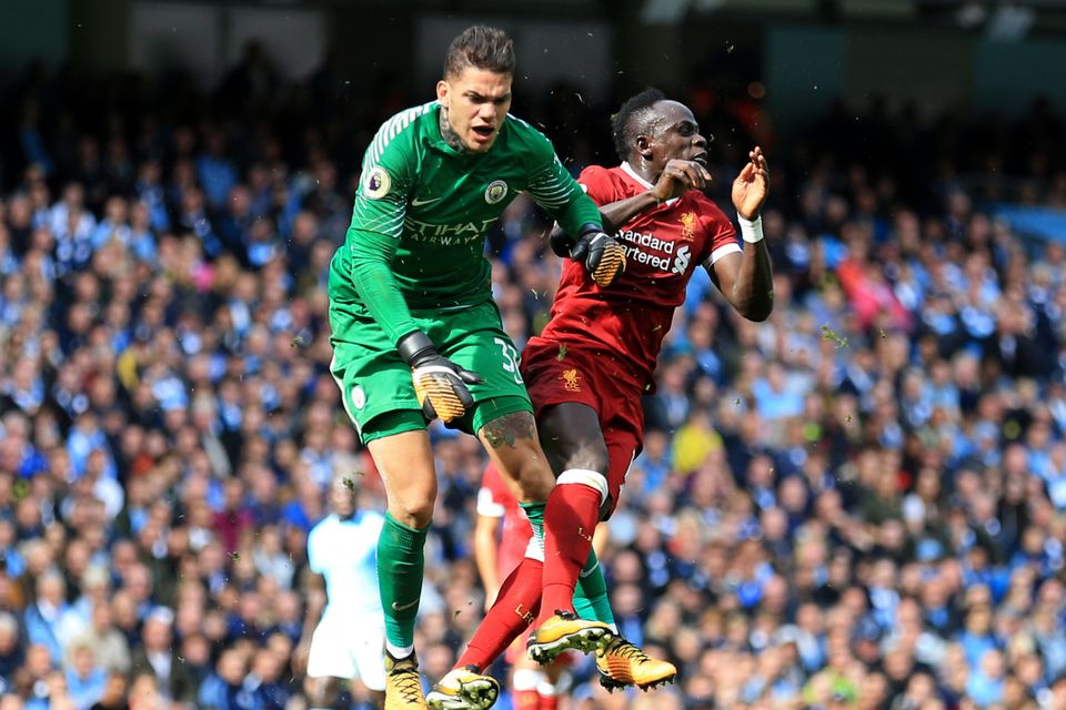Manchester City goalkeeper Ederson was injured in a clash with Liverpool's Sadio Mane