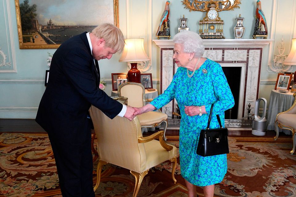 Britain's Queen Elizabeth welcomes Boris Johnson in Buckingham Palace
Photo credit: Victoria Jones/PA Wire