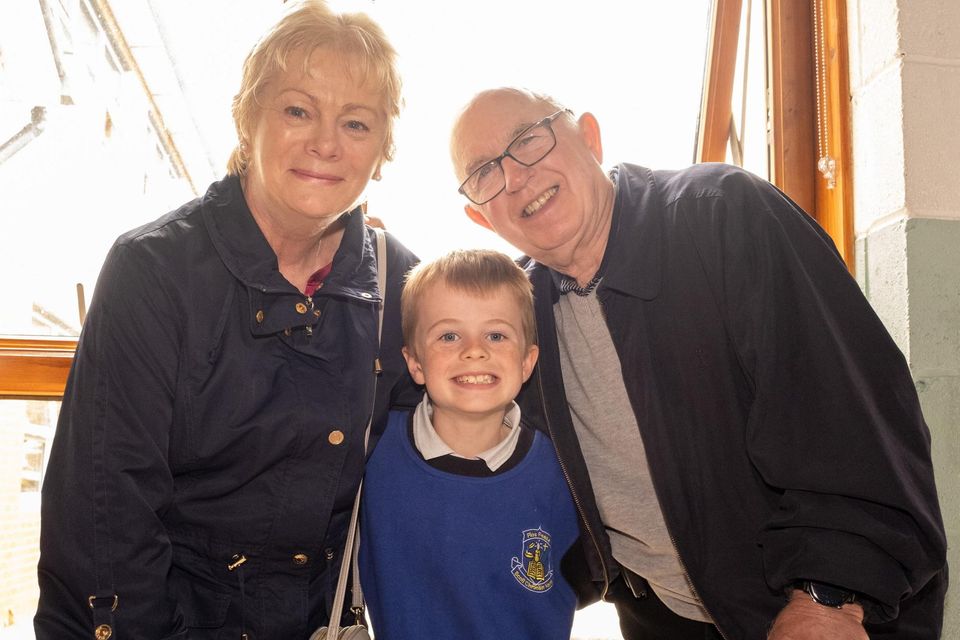Grandparents Day At St Cronan's BNS Bray. Dylan Delaney with grandparents Patricia and John Carney