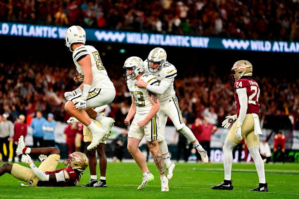 24 August 2024; Georgia Tech Yellow Jackets kicker Aidan Birr is congratulated by teammates after kicking the match winning field goal during the 2024 Aer Lingus College Football Classic match between Florida State and Georgia Tech at Aviva Stadium in Dublin. Photo by Brendan Moran/Sportsfile 