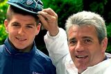 thumbnail: File photo dated 30-05-2000 of Liverpool player Steven Gerrard receives his first England cap from  Kevin Keegan following training at Bisham Abbey. Gerard will play his first England match at Wembley on Wednesday when they meet Ukraine for a friendly in the run up to Euro 2000.
Fiona Hanson/PA Wire.