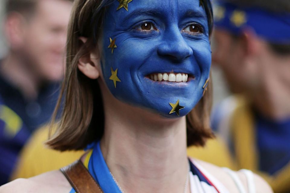 A Remain supporter wearing face paint and European flags