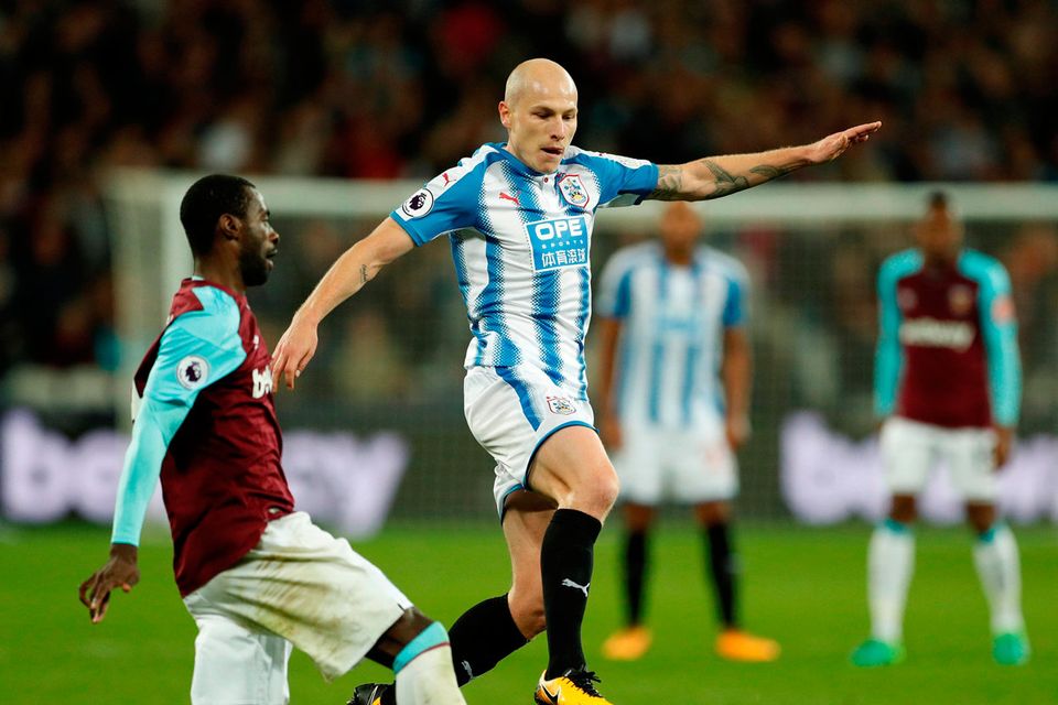 Huddersfield Town’s Aaron Mooy in action with West Ham United's Pedro Obiang. Photo: John Sibley/Reuters