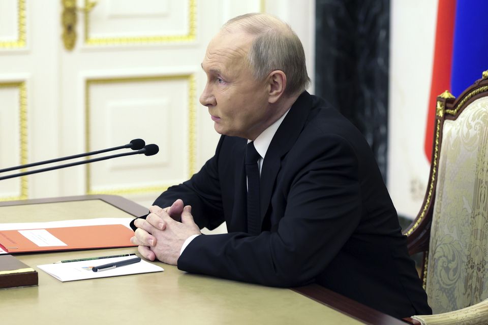 Russian President Vladimir Putin chairs a Security Council meeting in Moscow, Russia (Alexei Babushkin/AP)