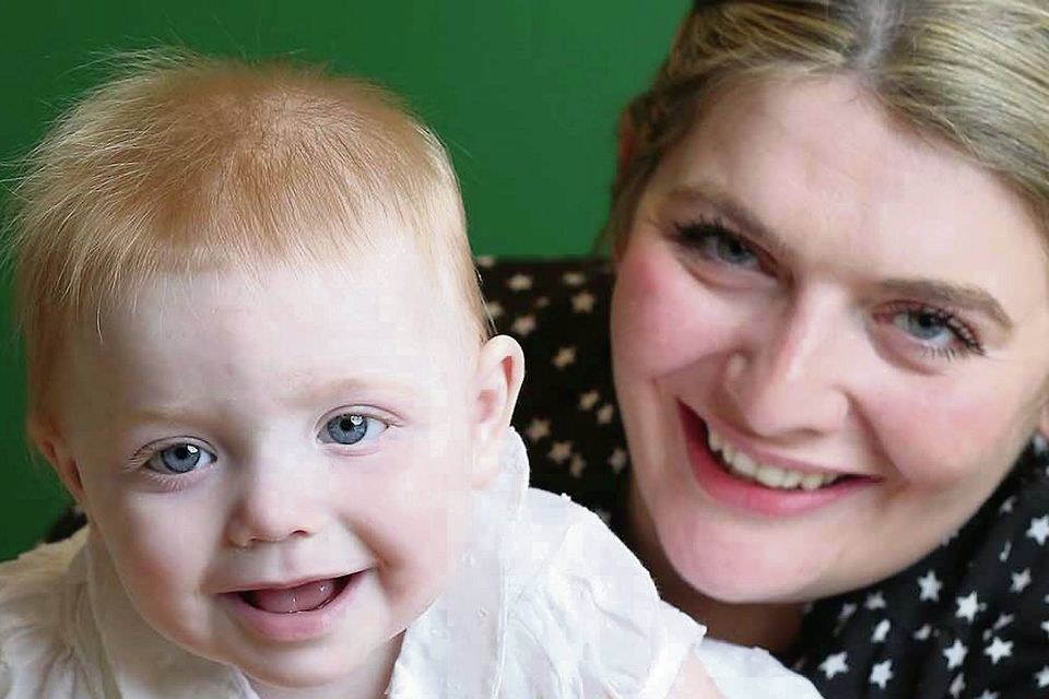 All smiles: Bryony Gordon with daughter Edie