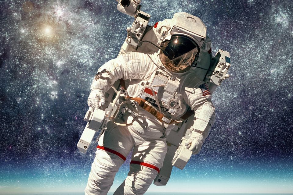 Astronaut in outer space against the backdrop of the planet Earth. Image by Andrey Armyagov and NASA