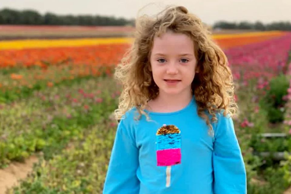 Emily Hand (8) was thought to have been murdered during the attack on Be'eri, but is now believed to be alive Photo: Tom Hand