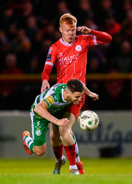Shane Farrell of Shelbourne tackles Dylan Watts of Shamrock Rovers during the SSE Airtricity Premier Division match at Tolka Park
