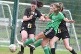 thumbnail: Carnew FC's Leanne Twamley and Kym Dixon compete with Margaret Doyle and Louise Corrigan of Wicklow Rovers during the Divisional Shield final at Gorey Rangers grounds on Sunday. 