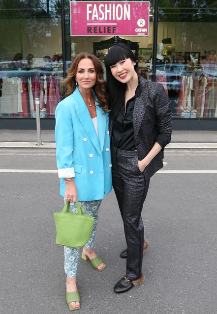  Lorraine Keane with model Yomiko Chen wearing a Caroline Kilkenny suit, €145, donated to the Fashion Relief boutique at the Frascati Centre in Blackrock