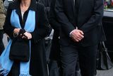 thumbnail: Niall Quinn, (son) and his mother, Mary, (wife), at St Marys Church, Killenaule, Co. Tipperary at the funeral of Billy Quinn