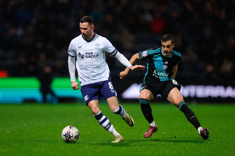 Alan Browne of Preston North End runs with the ball whilst under pressure from Harry Winks of Leicester City during the Sky Bet Championship match at Deepdale