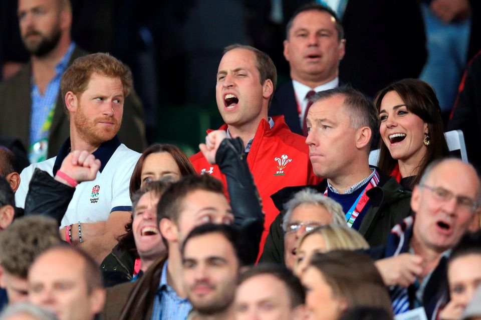 Prince Harry (left), The Duke of Cambridge (centre) and The Duchess of Cambridge before the Rugby World Cup match at Twickenham Stadium, London.