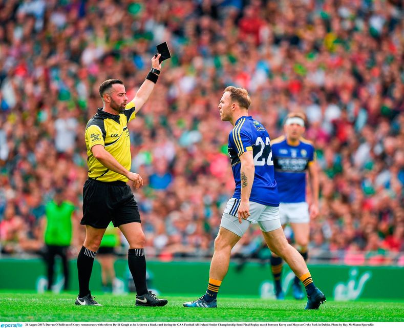 Darran O’Sullivan of Kerry remonstrates with referee David Gough as he is shown a black card