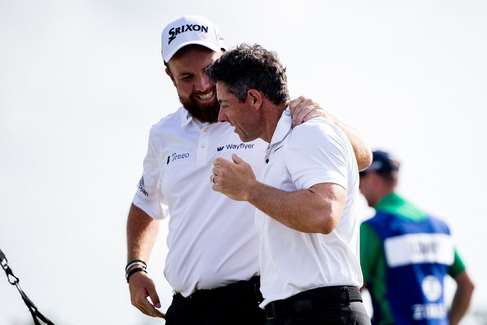 Rory McIlroy and Shane Lowry celebrate after the final round of the Zurich Classic of New Orleans golf tournament