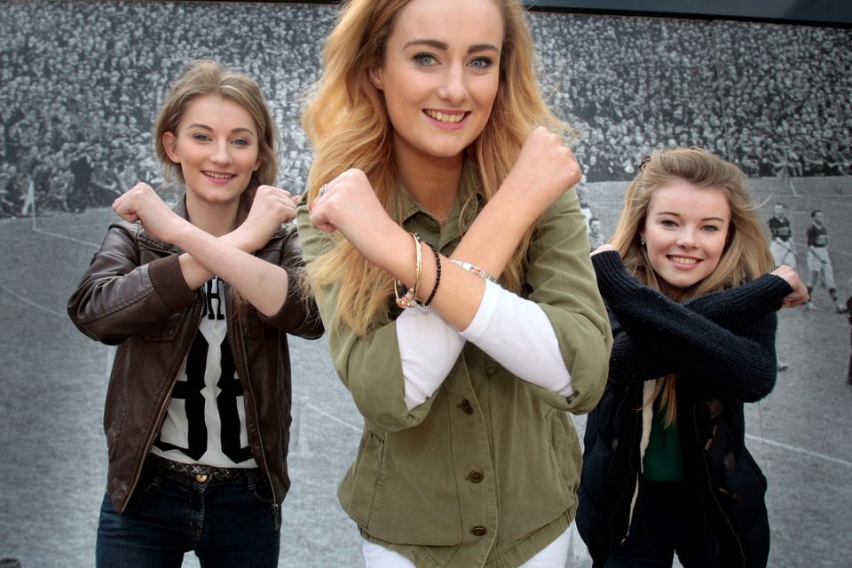 Triplets Katherine Maguire,(centre) from Wexford who auditioned for X Factor at Croke Park yesterday, pictured with her sisters Ellen (left) and Ciara .Pic Tom Burke 8/4/2015