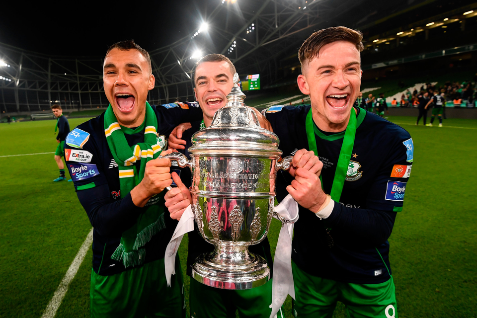 Shamrock Rovers’ Graham Burke, Sean Kavanagh and Ronan Finn celebrate victory in last year’s FAI Cup Final