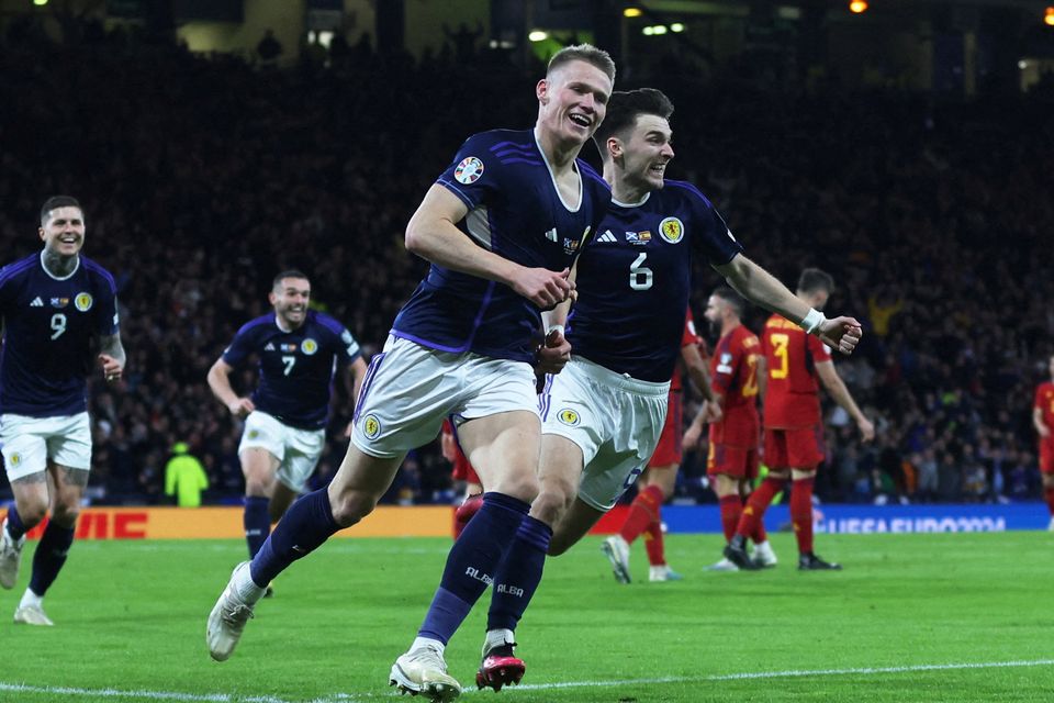 Scotland's Scott McTominay celebrates scoring their second goal with Kieran Tierney in the Euro 2024 qualifying win over Spain at Hampden Park, Glasgow