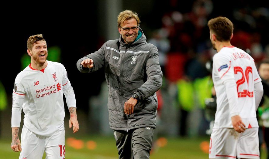 Liverpool manager Juergen Klopp celebrates with Alberto Moreno and Adam Lallana at the end of the match
Action Images via Reuters / Henry Browne
