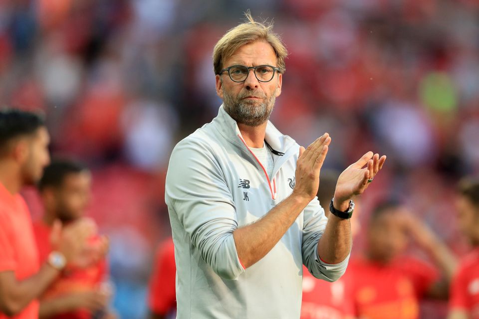 Liverpool boss Jurgen Klopp applauds after his team's Wembley win over Barcelona