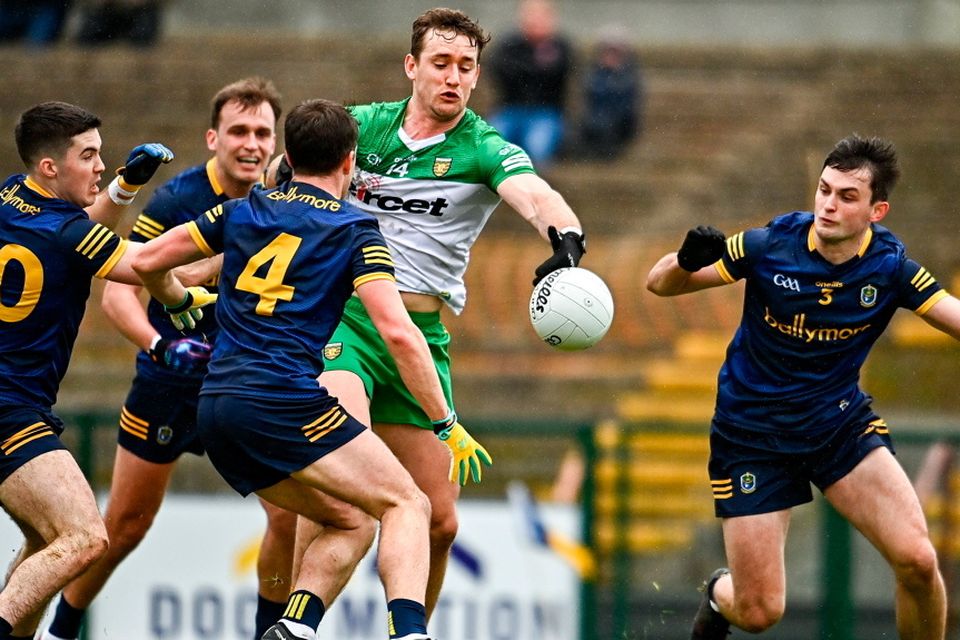 Hugh McFadden of Donegal in action against, Roscommon players, from left, Ruaidhrí Fallon, Enda Smith, David Murray and Brian Stack