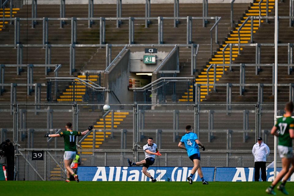 Dublin goalkeeper Stephen Cluxton kicks the  ball out in front of an empty section of Hill 16 during the Leinster SFC quarter-final match against Meath. Photo: Sportsfile