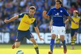 thumbnail: Leicester City's Leonardo Ulloa (right) and Arsenal's Aaron Ramsey (left) battle for the ball