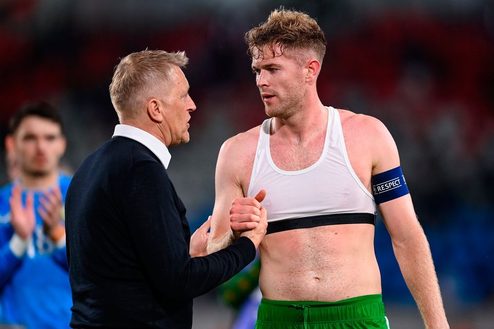 Republic of Ireland head coach Heimir Hallgrimsson with Nathan Collins. Photo: Stephen McCarthy/Sportsfile