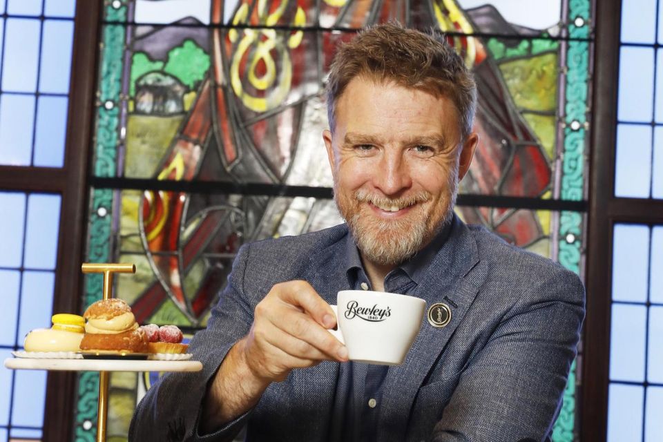 Bewley's MD Cól Campbell pictured in front of a Harry Clarke stained glass window at the Grafton St cafe in Dublin. Photo: Leon Farrell/Photocall Ireland