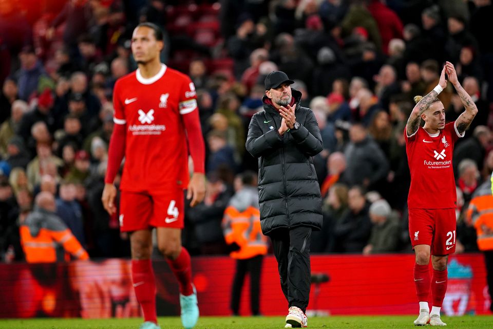 Liverpool manager Jurgen Klopp (centre) applauds the fans (Peter Byrne/PA)