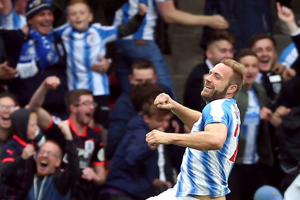 Huddersfield's Laurent Depoitre celebrates scoring against Manchester United