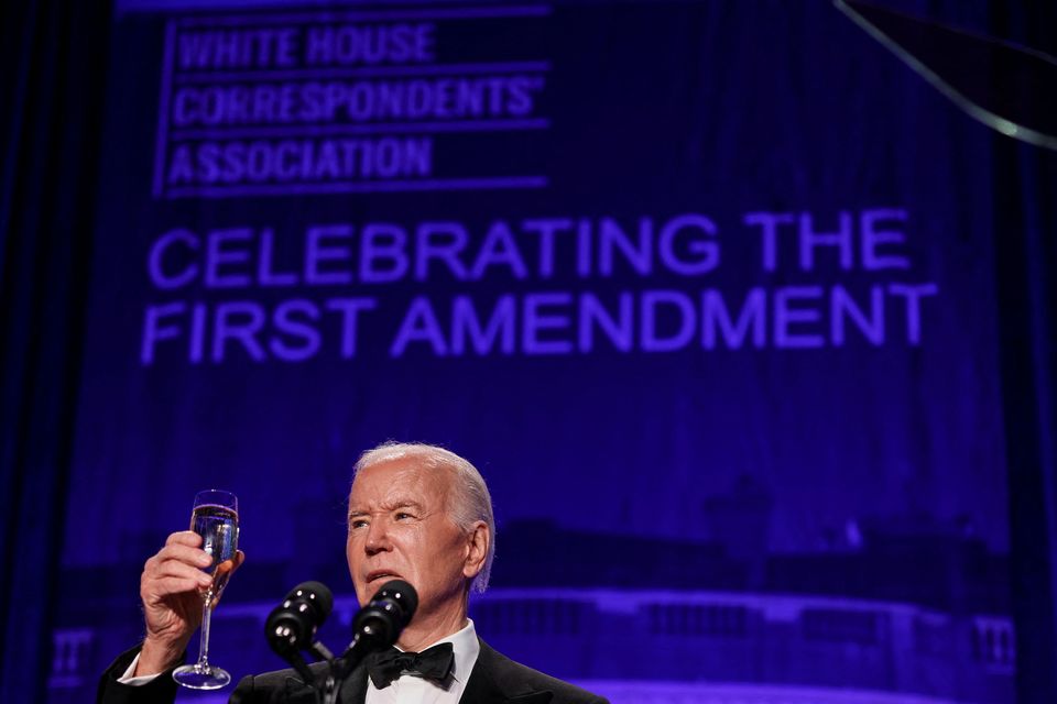 U.S. President Joe Biden raises a toast as he speaks during the White House Correspondents' Association Dinner in Washington, U.S., April 27, 2024. REUTERS/Tom Brenner