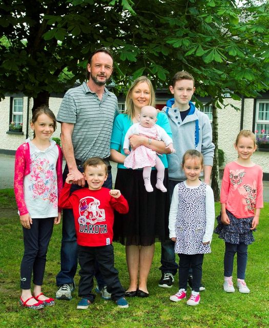 Mark and Karen O’Connell with their children ranging from 5 months to 14 years, Katie, Damien, Aimee, Dylan, Emma and Erin. Picture: Garry O'Neill