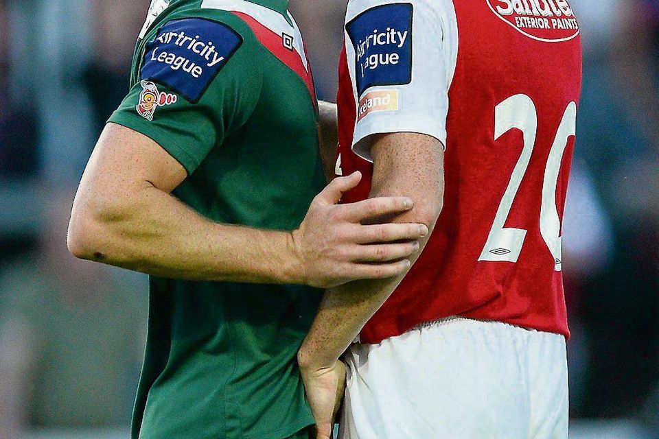 Kalen Spillane clashes with Anto Flood in the incident which resulted in the Cork City player being sent off at Richmond Park