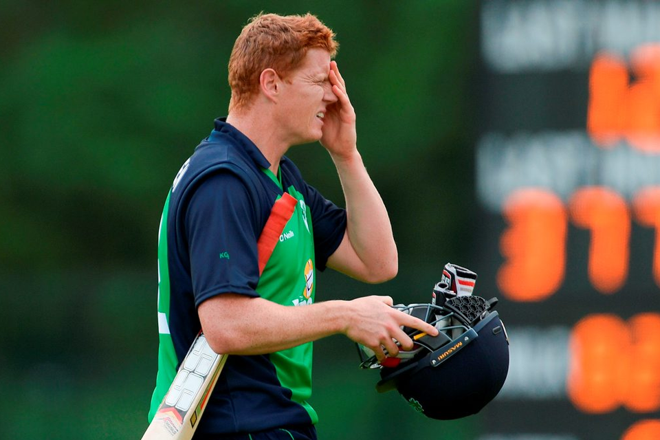 Ireland’s Kevin O’Brien leaves the field after being caught by Farees Maharoof from a delivery by Dasun Shanaka at Malahide. Photo: Seb Daly/Sportsfile